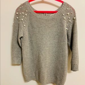 Grey sweater with pearl accents
